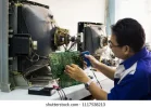 tv-repairman-working-repair-television-260nw-1117538213.jpg.webp