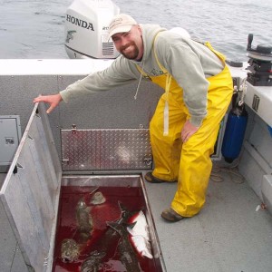 Cory.with.our.Halibut.catch.jpg