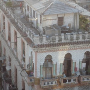 A roof top from the hotel with pigs 'n chickens.