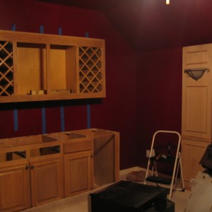 Wet bar and wine rack being installed