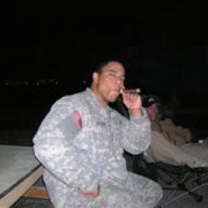 PO2 Cordero at the fire pit in Kunduz, Afghanistan