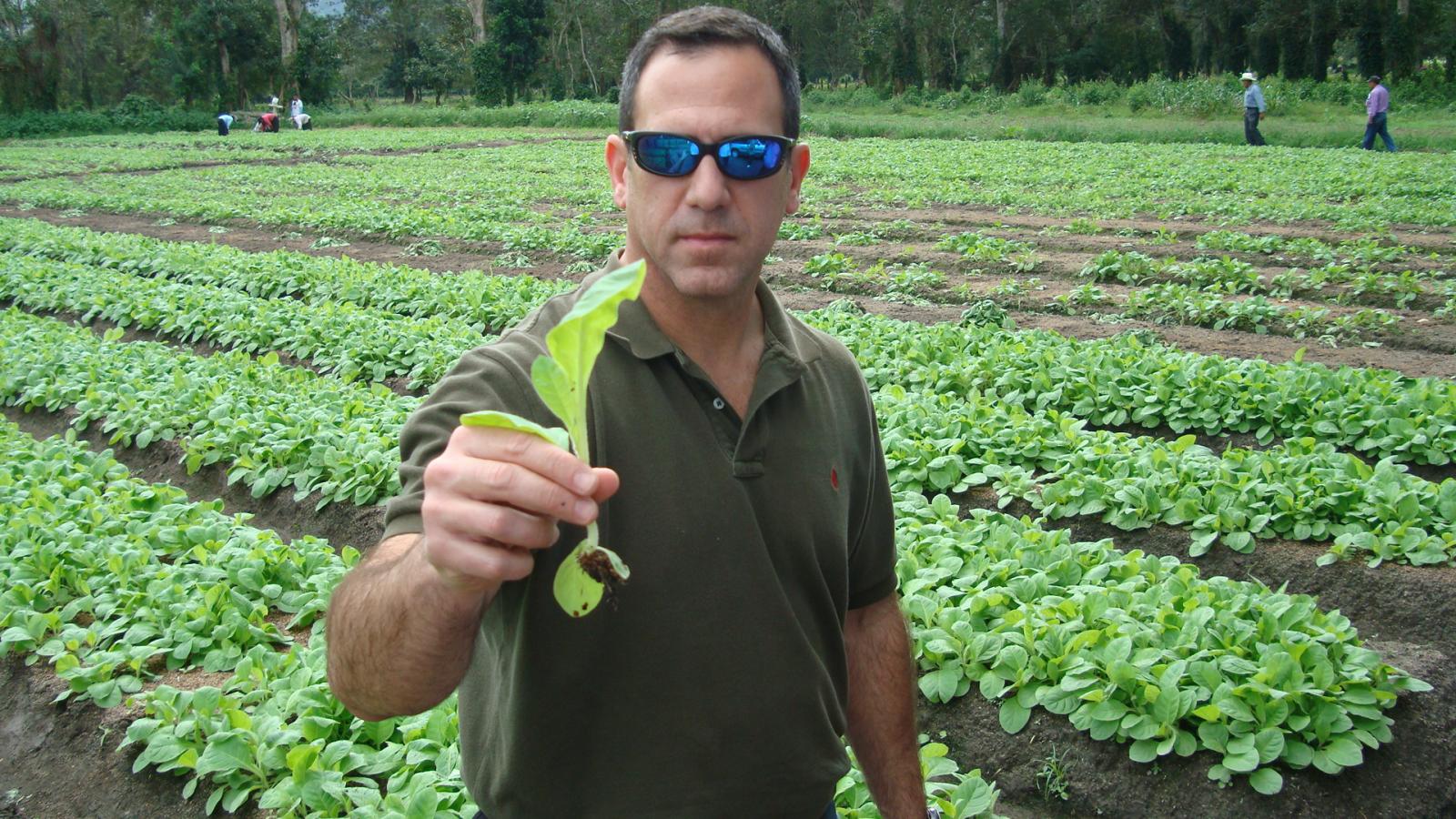 Jorge Padron showing off a baby plant