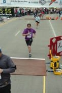 Matt crossing the finish line - White Rock 13.1 marathon 12/