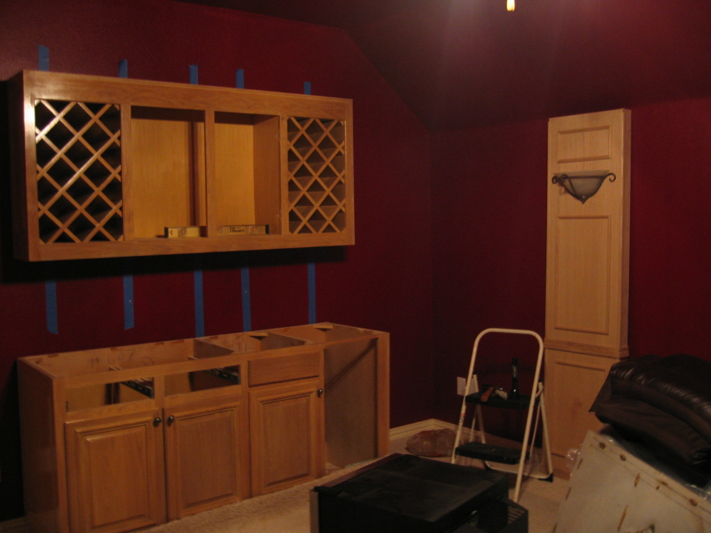Wet bar and wine rack being installed